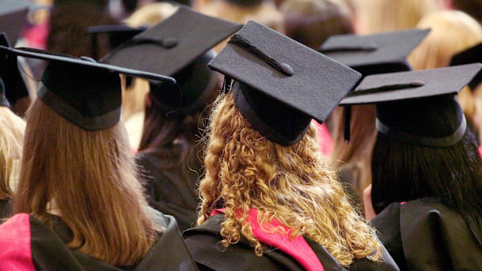 Student loan system acts as 'tax on ambition', graduates tell MPs