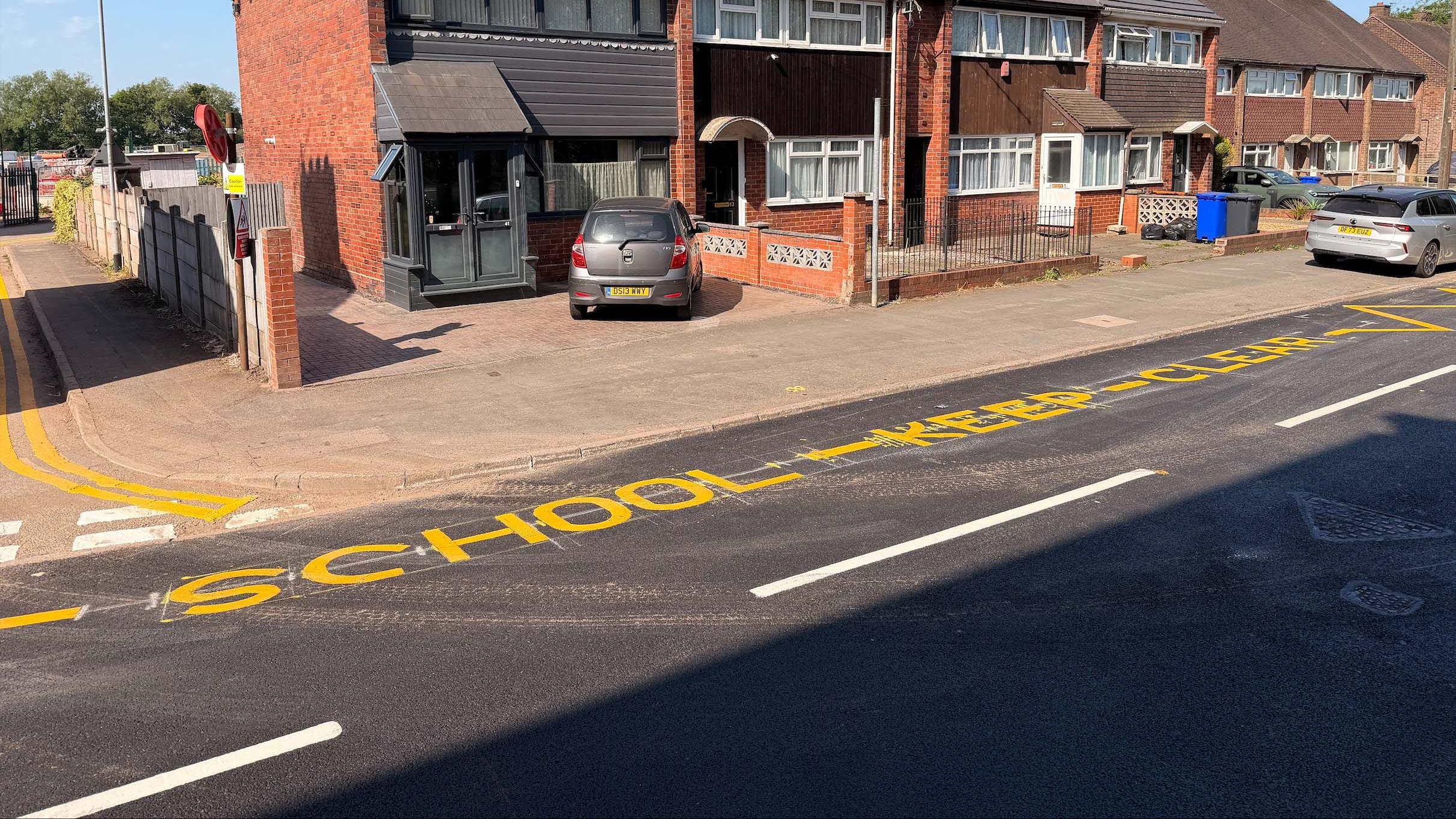 School keep clear' sign appears 15 years too late