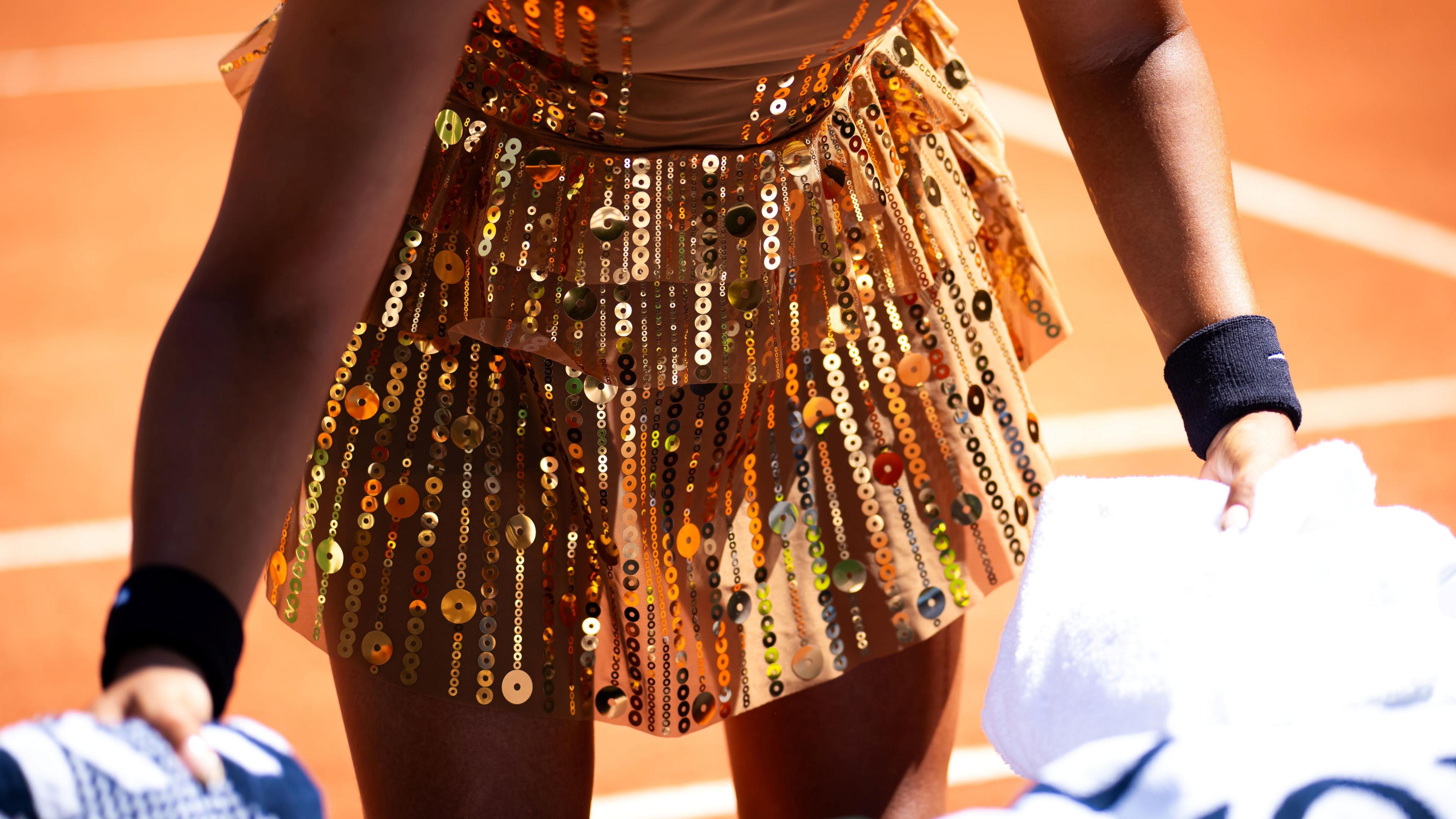 French Open 2026 results: Naomi Osaka sparkles in golden 'Eiffel Tower'  outfit in first-round win - BBC Sport