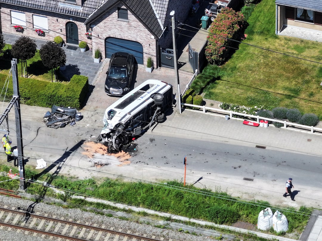 Belgian train hits school minivan, killing four including pupils | Reuters