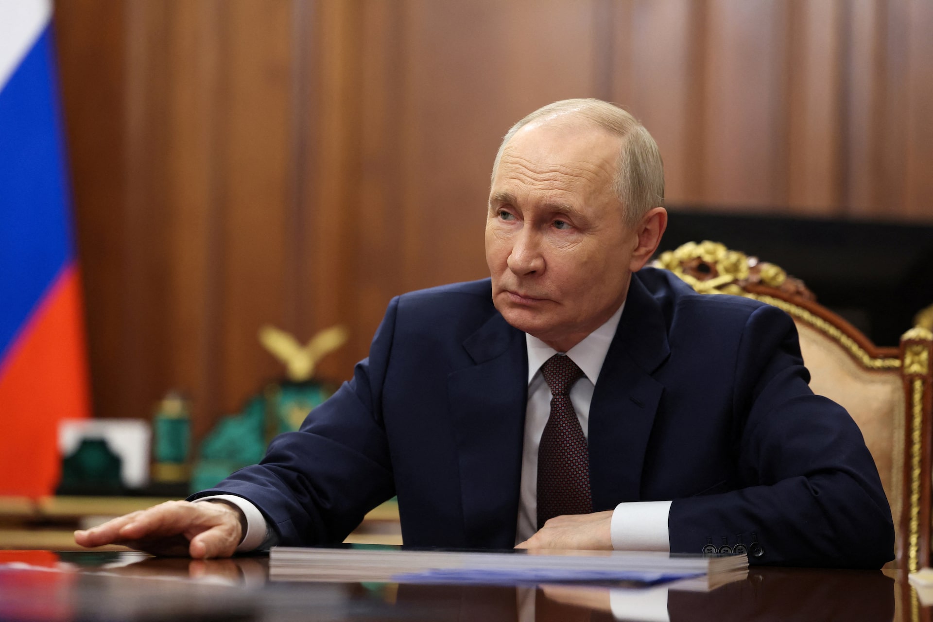 Russia's Putin provides debt relief to new Ukraine war recruits and their  families | Reuters