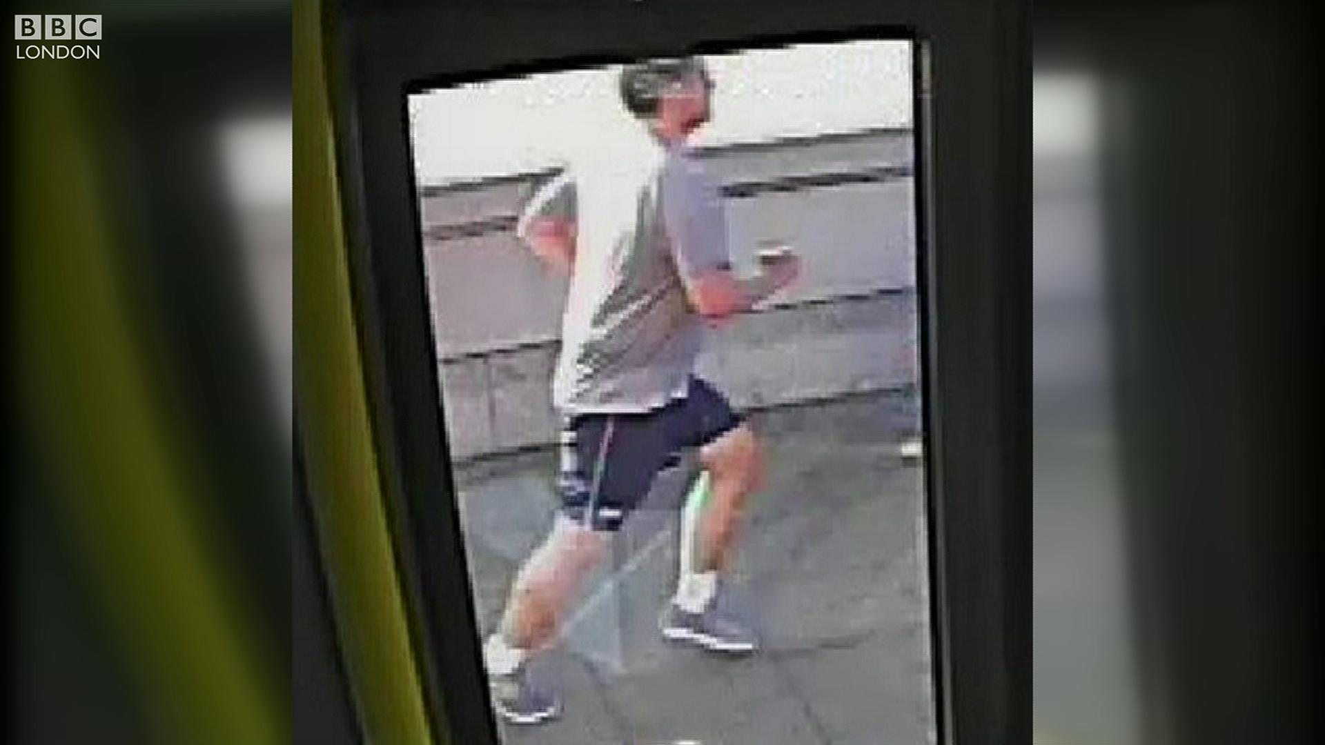 Putney Bridge: CCTV of jogger 'pushing' woman in front of bus - BBC News